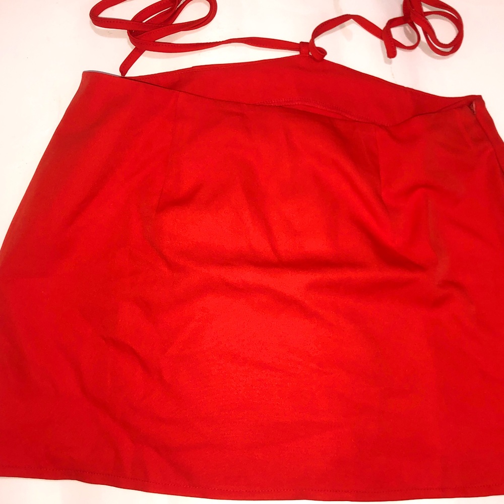 Bright orange skit with straps